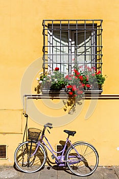 Window of a mediterranean house with bicycle