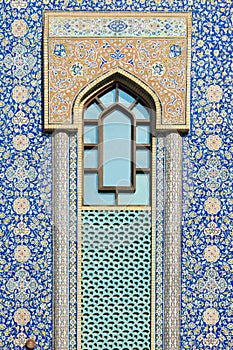 Window of a mosque in Dubai with beautiful ornamental tiles decorated.