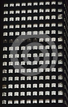 Window of the night empty multi-storey skycraper