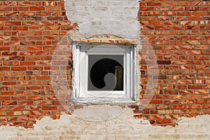Window and old brick wall