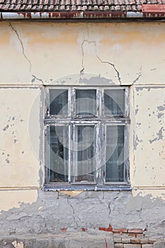 Window on old house in bad condition