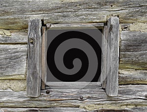 Window in an old log cabin.