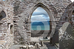 Monastary Window with ocean and mountain