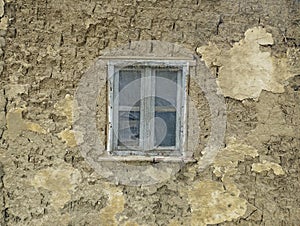 Window on old mud house in Vojvodina Serbia