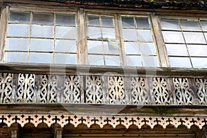 Window of old residential wooden building.