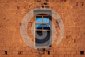 Window in old ruined abandoned house