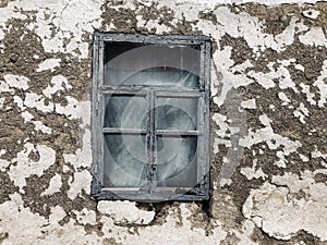 Window of an old Ukrainian ruined house