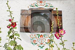 Window on the old wall of traditional ukrainian house