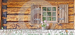 Window of an old wooden cottage.