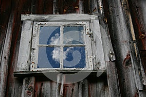 Window at old, wooden house in Norway