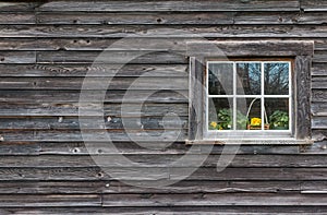 Window of old wooden log house