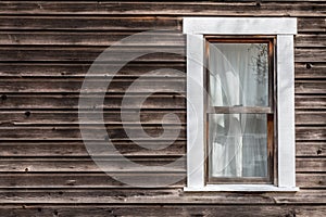 Window of old wooden log house