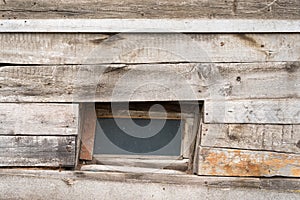 The window of the old wooden log house
