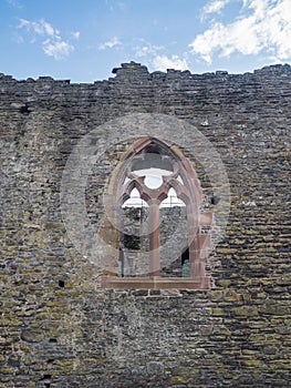 Window in one of the walls at Conwy Castle, Wales