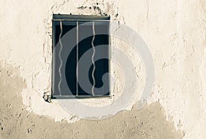 Window opening with bars in wall