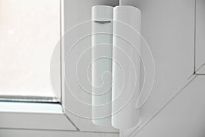 window opening sensor hanging on the window, home alarm system, home protection