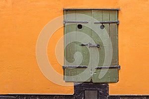 Window on orange wall