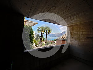 Window out of a underground car park built in mountain.