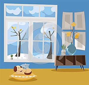 Window overlooking winter snow-covered trees. Winter interior sleeping cat and dog, shelf, vase with branches in blue and yellow
