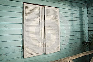 Window in a palm bungalow