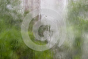 Window pane during a downpour