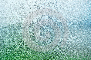 A window pane of frosted grass