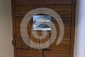 A window for passing food and observing prisoners in the door of a single cell in the Trubetskoy Bastion prison