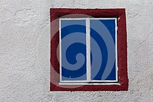 Window in pebble dashed wall