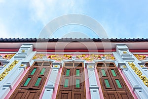 Window with pink background in Chino-Portuguese style, Phuket Thailand photo