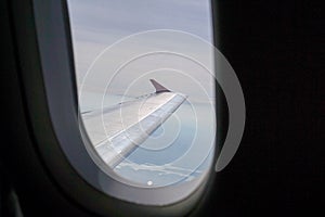 The window of the plane taken from the outside