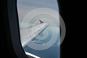 The window of the plane taken from the outside