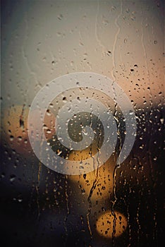 Window raining water drops on a window