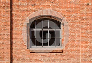 The window in red brick wall.