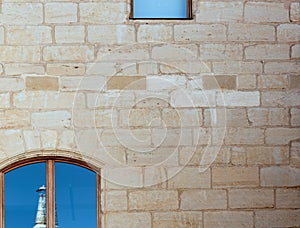 window with reflections in the stone wall part 2