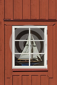 Window with sailingboat photo
