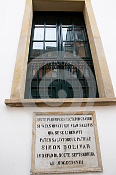 Window of the San Carlos Palace through which Bolivar escaped from the attack photo