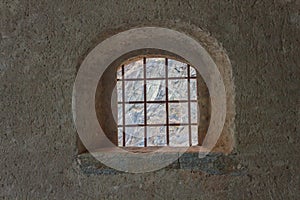 Window with security grating of an ancient castle