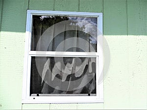 Window on shed, noon in summer