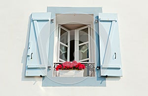 Window with shutters