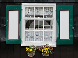 Window with shutters in Marken