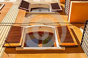 Window shutters on an old european style building, architectural