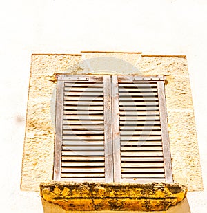 Window shutters on an old european style building, architectural