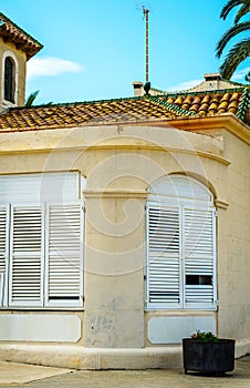 Window shutters on an old european style building, architectural