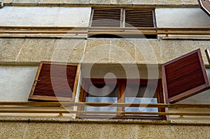 Window shutters on an old european style building, architectural