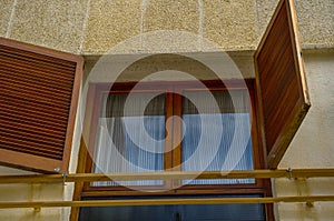 Window shutters on an old european style building, architectural