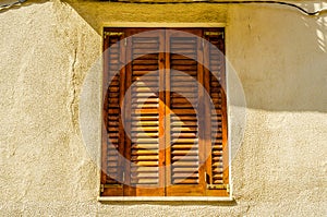 Window shutters on an old european style building, architectural