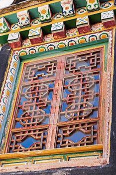 Window in Songzanlin Temple or the Ganden Sumtseling Monastery also known as little Potala Palace in Lhasa, is a Tibetan Buddhist