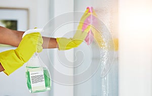 Window, spray and hands cleaning in a home for hygiene, germ protection and maintenance with a chemical in a house