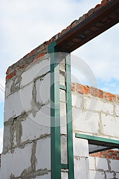 Window steel lintel on brick house construction. photo