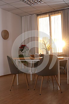 Window with stylish curtains in living room